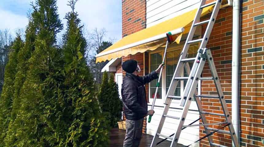 Cleaning of awnings. Brushing